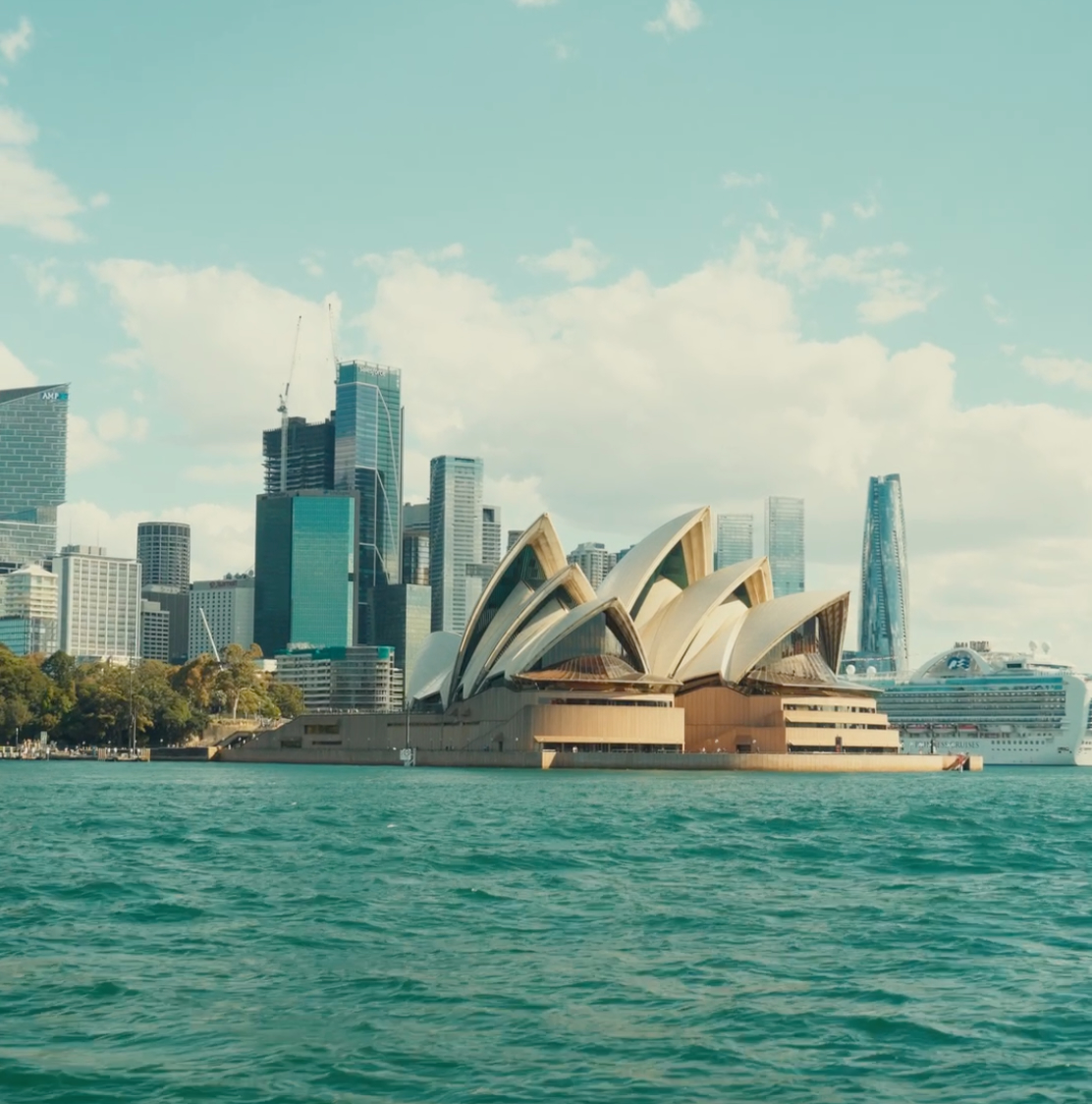 Sydney Opera House and city skyline across Sydney Harbour